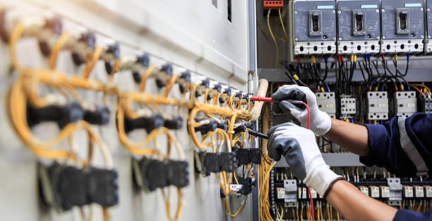 Professional Electrician technician working in Henryville, IN